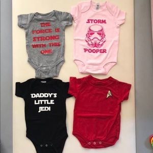 Four onesies in newborn, 3months, and two 6months